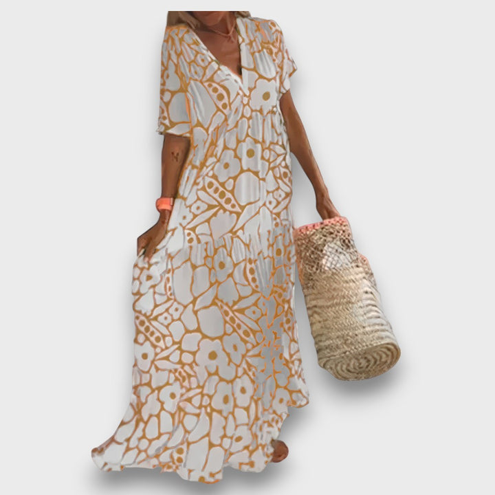 Dugana haljina s cvjetnim uzorkom i gumbima