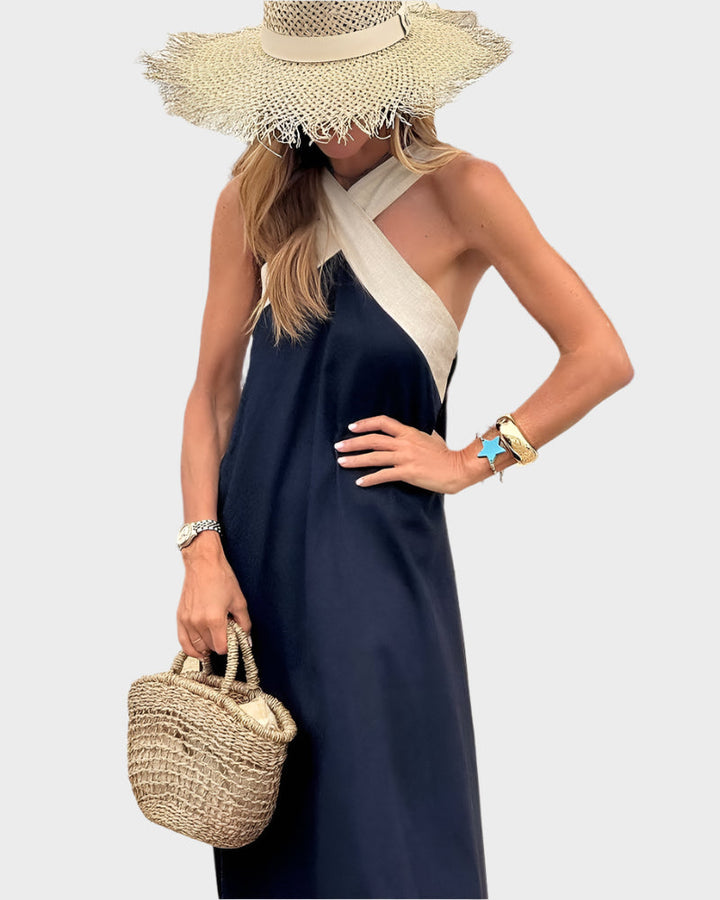 Elegantna haljina s otvorenim leđima i modernim preklopljenim okom