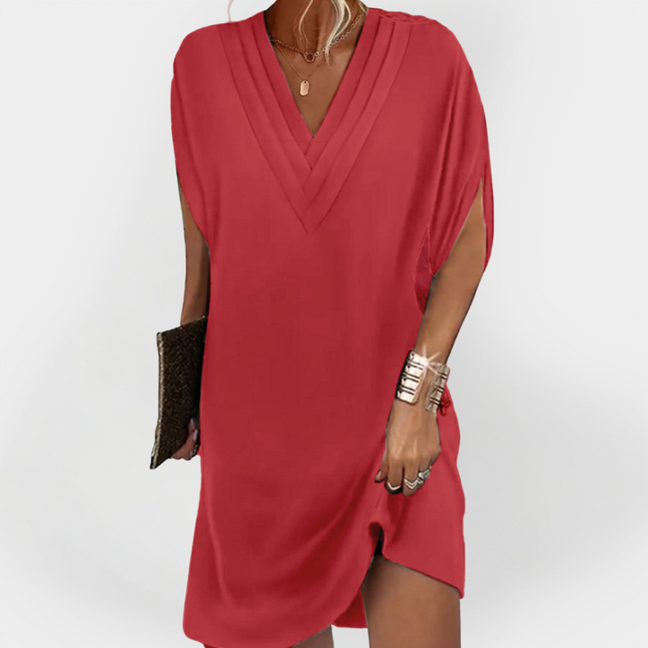 Elegantna haljina s laskavim krojem