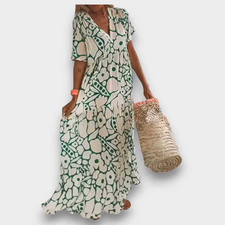 Dugana haljina s cvjetnim uzorkom i gumbima