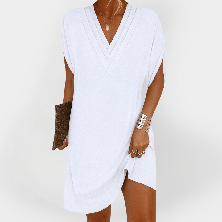 Elegantna haljina s laskavim krojem