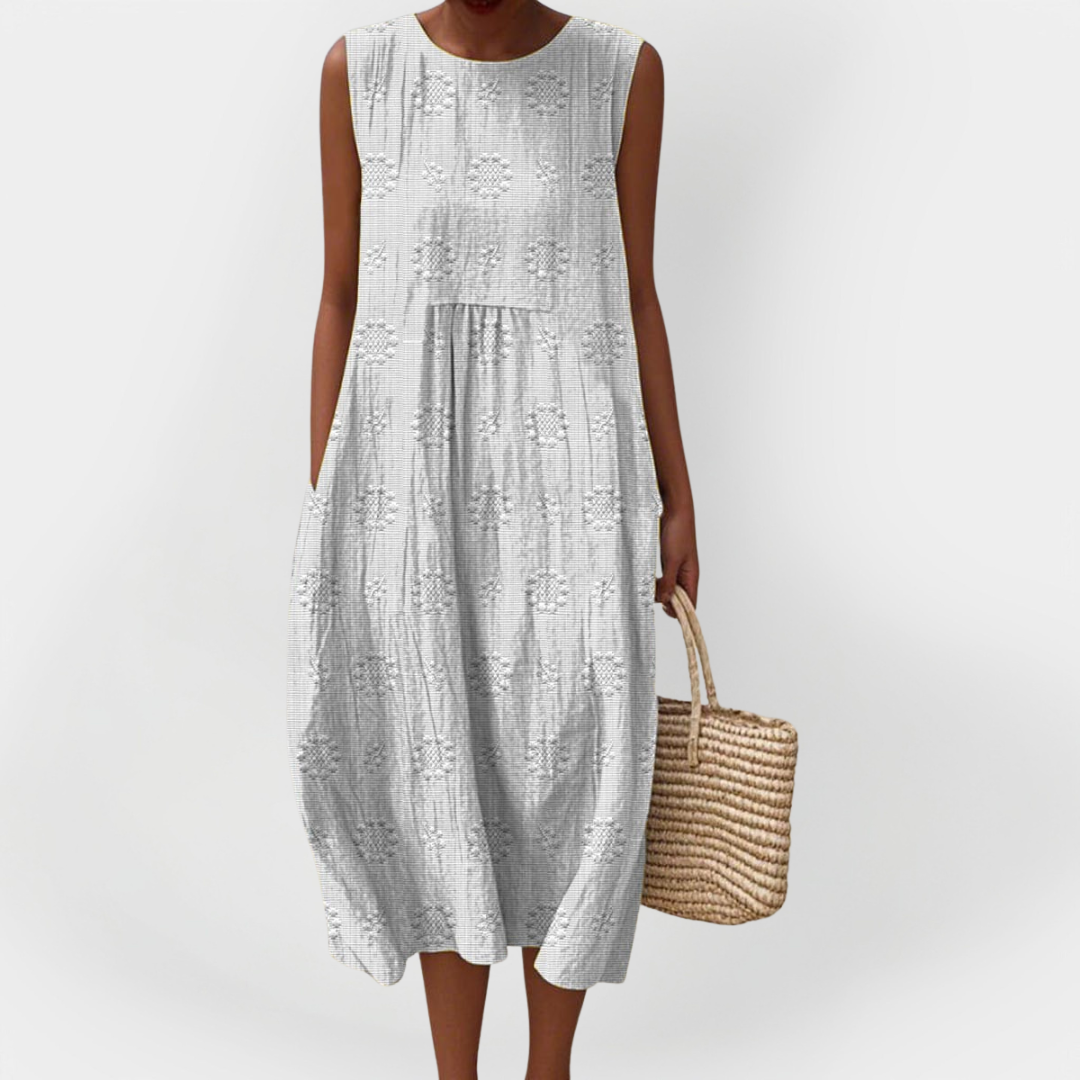 Elegantna pamučna haljina bez rukava s džepovima