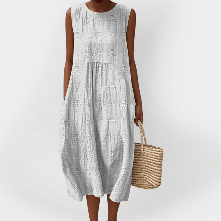 Elegantna pamučna haljina bez rukava s džepovima