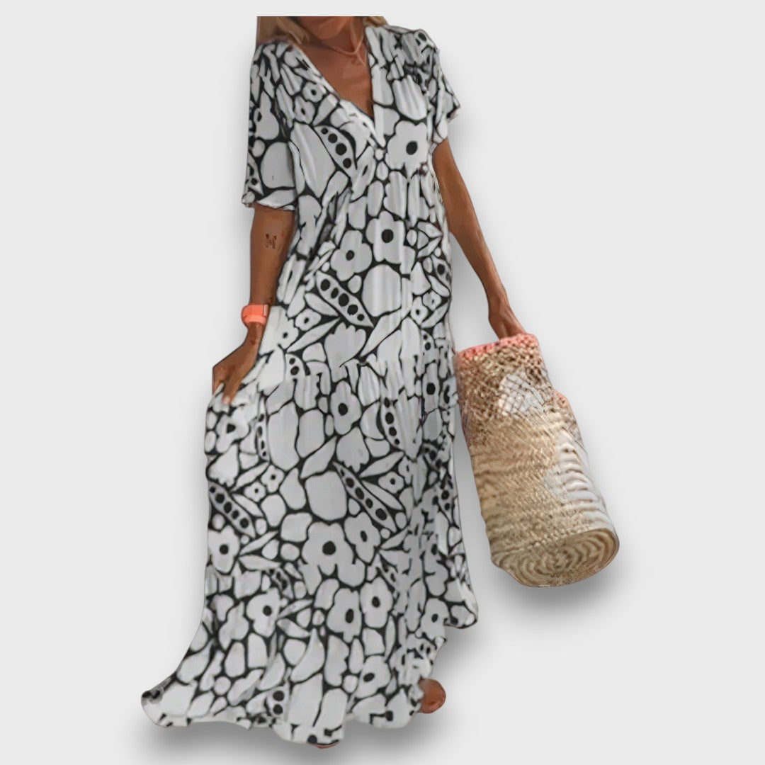 Dugana haljina s cvjetnim uzorkom i gumbima