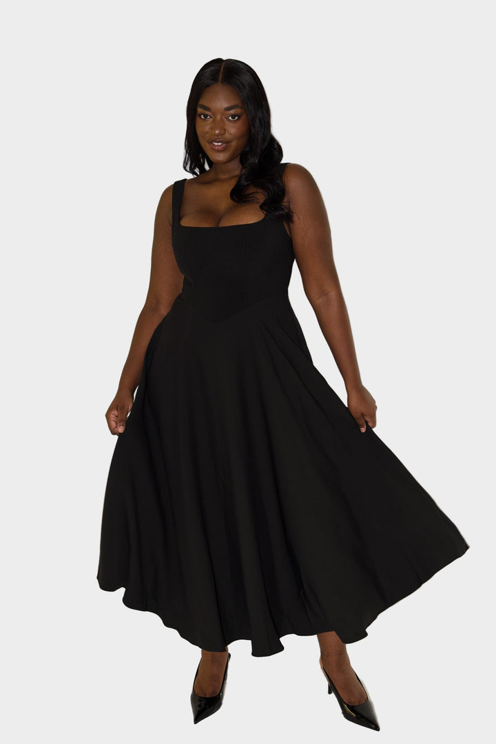 Vječna lagana midi haljina s elegantnim krojem i prirodnim pokretom