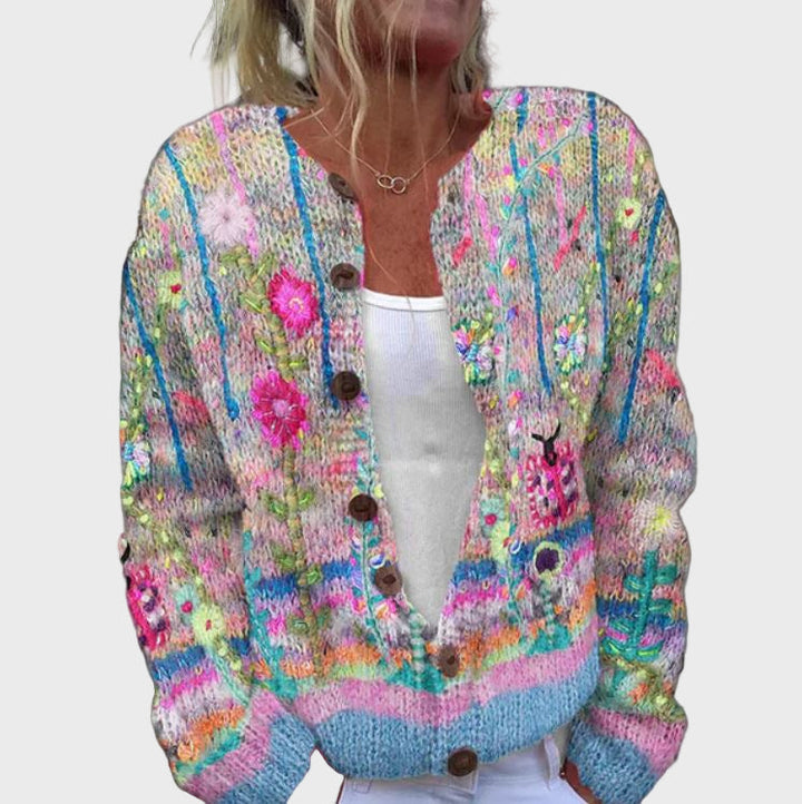 Elegantno pleteno prsluk s cvjetnim uzorkom