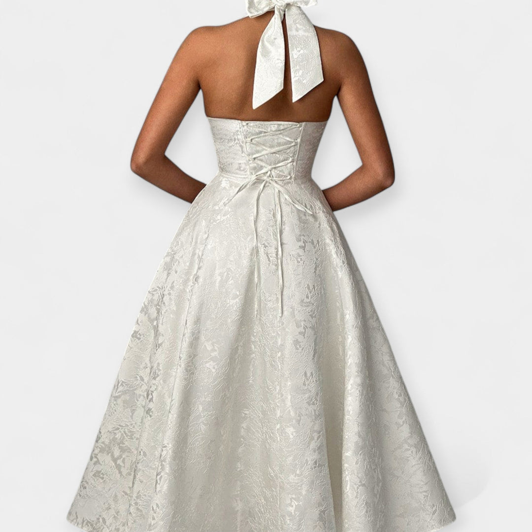 Srednje dužine haljina s otvorenim leđima i krojenjem s korzetom