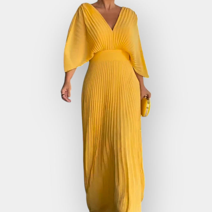 Elegantno plisirano haljina s modernom krojem